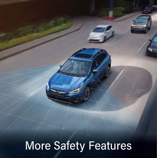 A Subaru Crosstrek in blue with the words &ldquo;More Safety Features&ldquo;. | Subaru World of Hackettstown in Hackettstown NJ