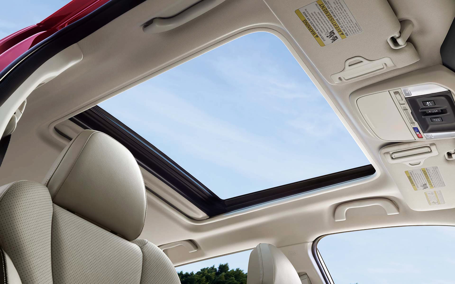 A view through the power sliding panoramic moonroof on the 2022 Forester Sport. | Subaru World of Hackettstown in Hackettstown NJ