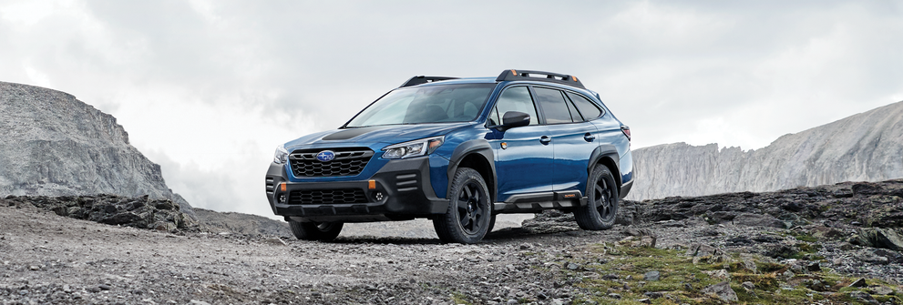 A 2023 Outback Wilderness parked in the mountains. | Subaru World of Hackettstown in Hackettstown NJ