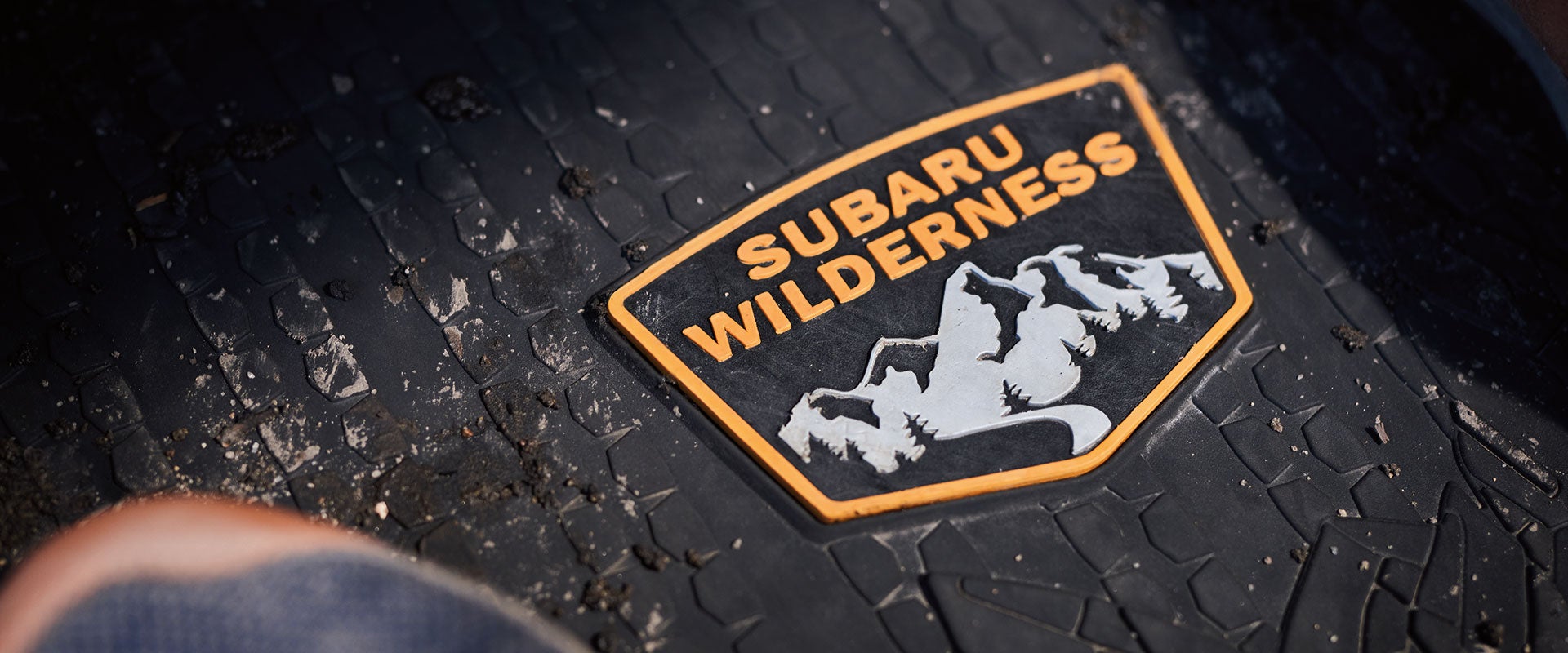 Subaru Wilderness badge on interior cabin weather mat